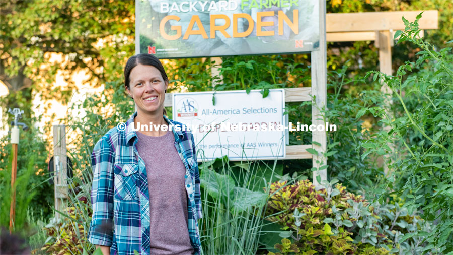 Ann Powers, a Research Technician for Agronomy and Horticulture, works in the Backyard Farmer Gardens. August 6, 2019. Photo by Gregory Nathan / University Communication.